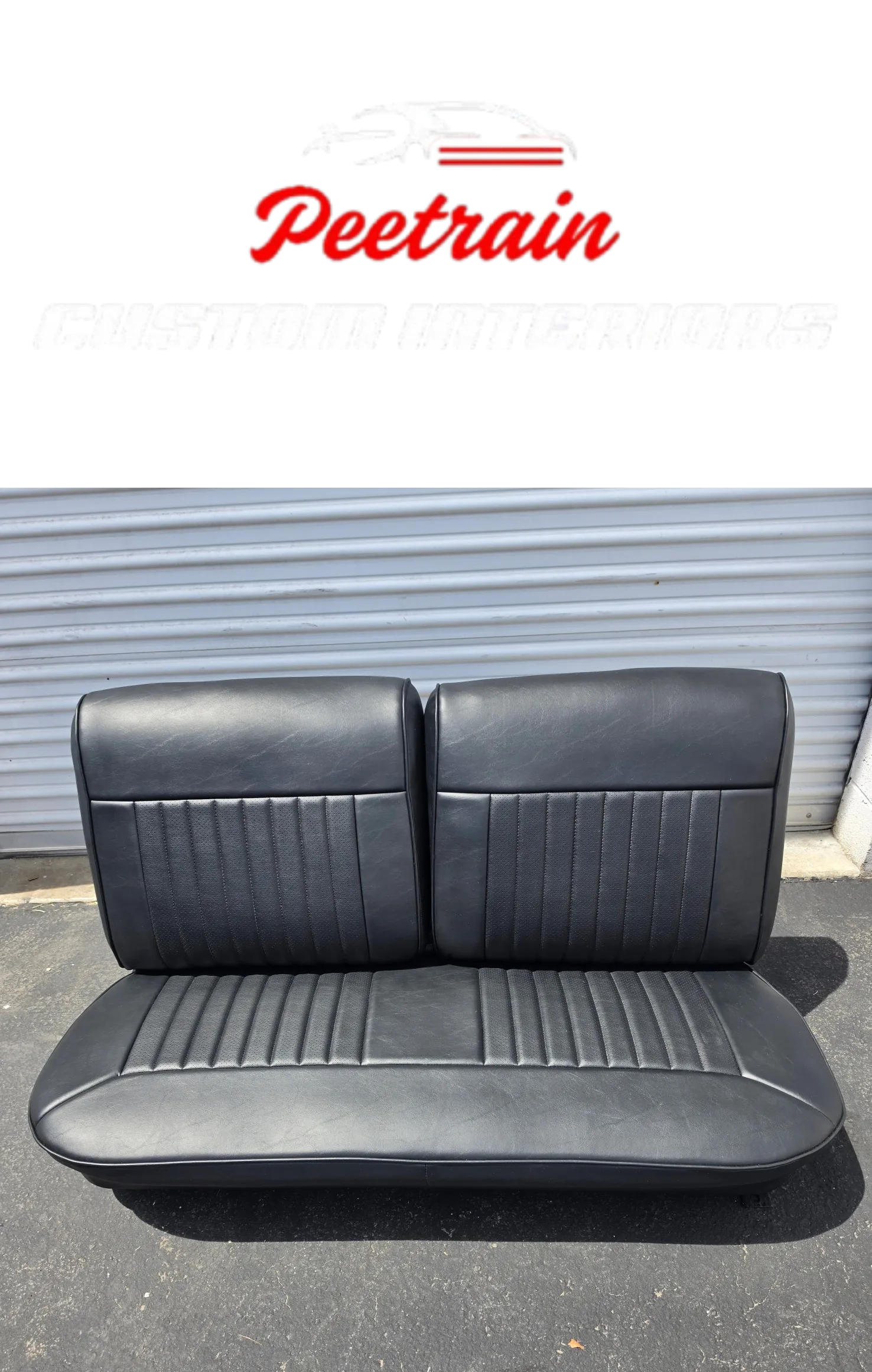 Black leather seat cover for a car with a white background